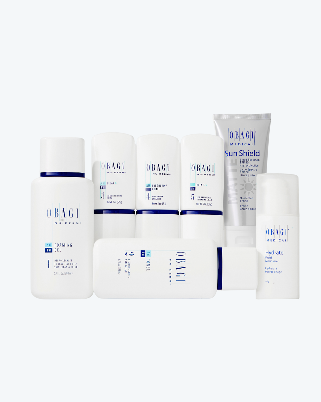 A set of Obagi Skincare products arranged on a light gray background, including a Cleanser, Moisturizer, Sunscreen, Sun Shield, and Hydrate Toner in white and silver packaging with blue accents.
